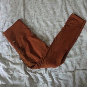 Fabletics Burnt Orange Trinity Motion365 Mid-Rise 7/8 Leggings